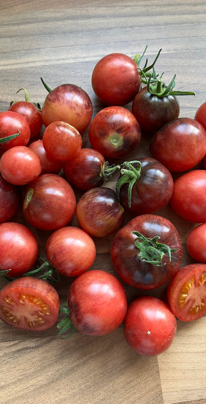 Close-up of cherry tomatoes on a wooden surface